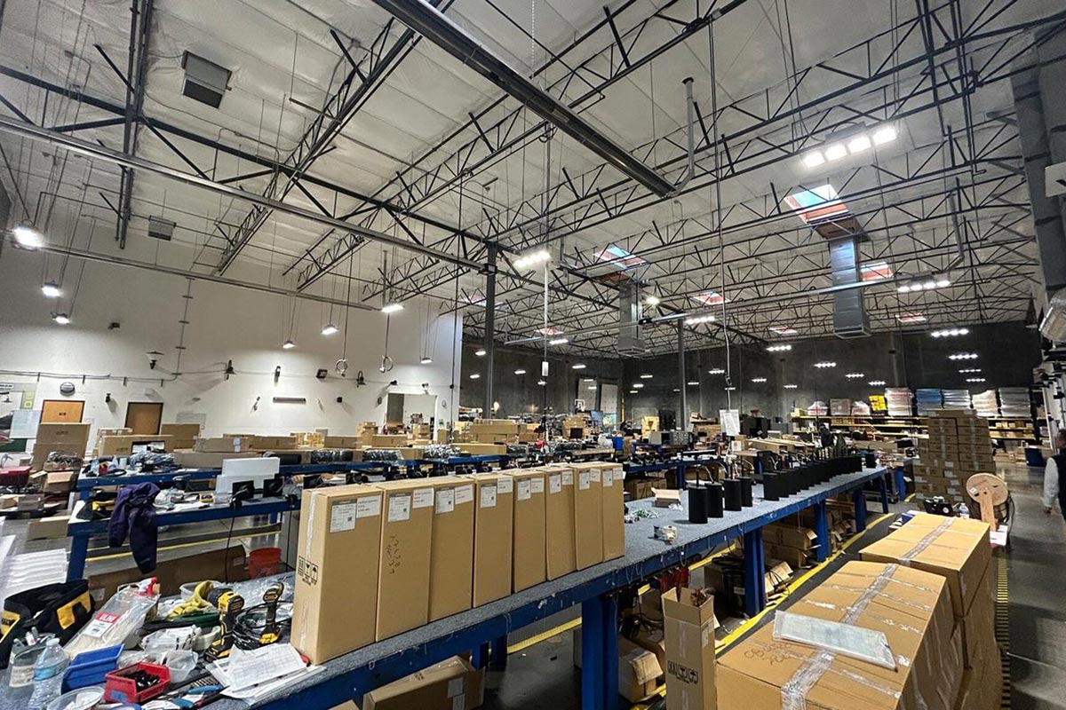 About Factory A photo of boxes inside a Ligman production facility