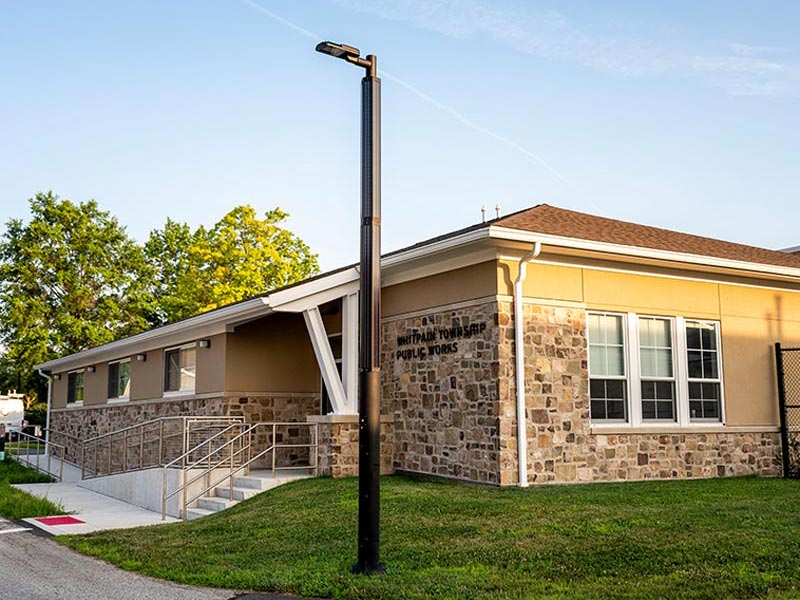 Custom Solar Lighting A solar-powered post-top luminaire