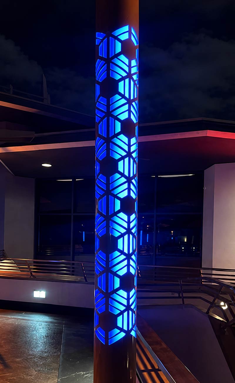Custom Light Column A blue custom light column featuring geometric cutouts