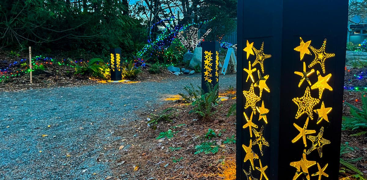 Custom Lighting Inviting light columns with custom starfish-shaped cutouts