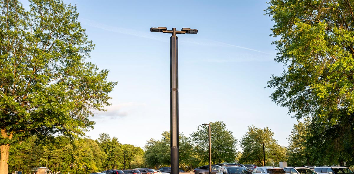 Hybrid Section A Zenith solar streetlight standing in a parking lot