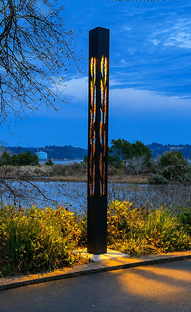 Custom Light Column A custom light column featuring seaweed-shaped cutouts